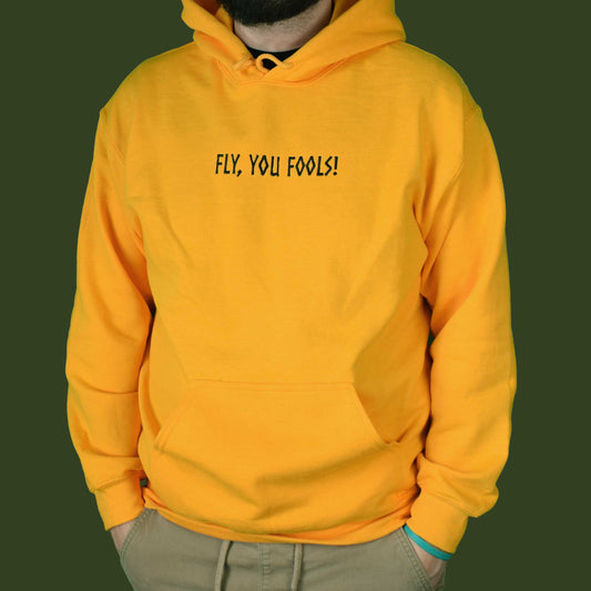 žuta hudica s vezom natpisa "Fly, you fools!"