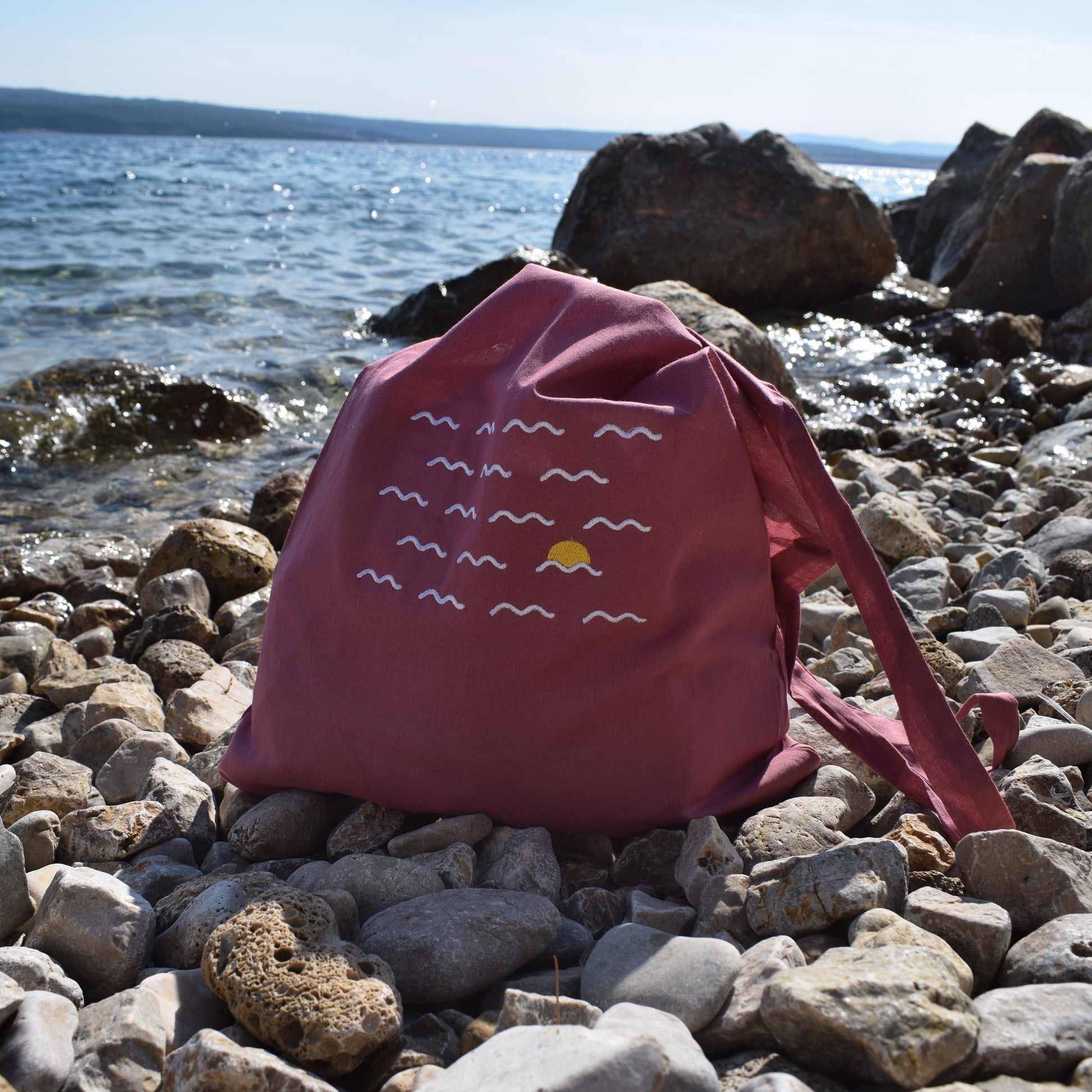 rozi pamučni ceker s vezom valova i sunca