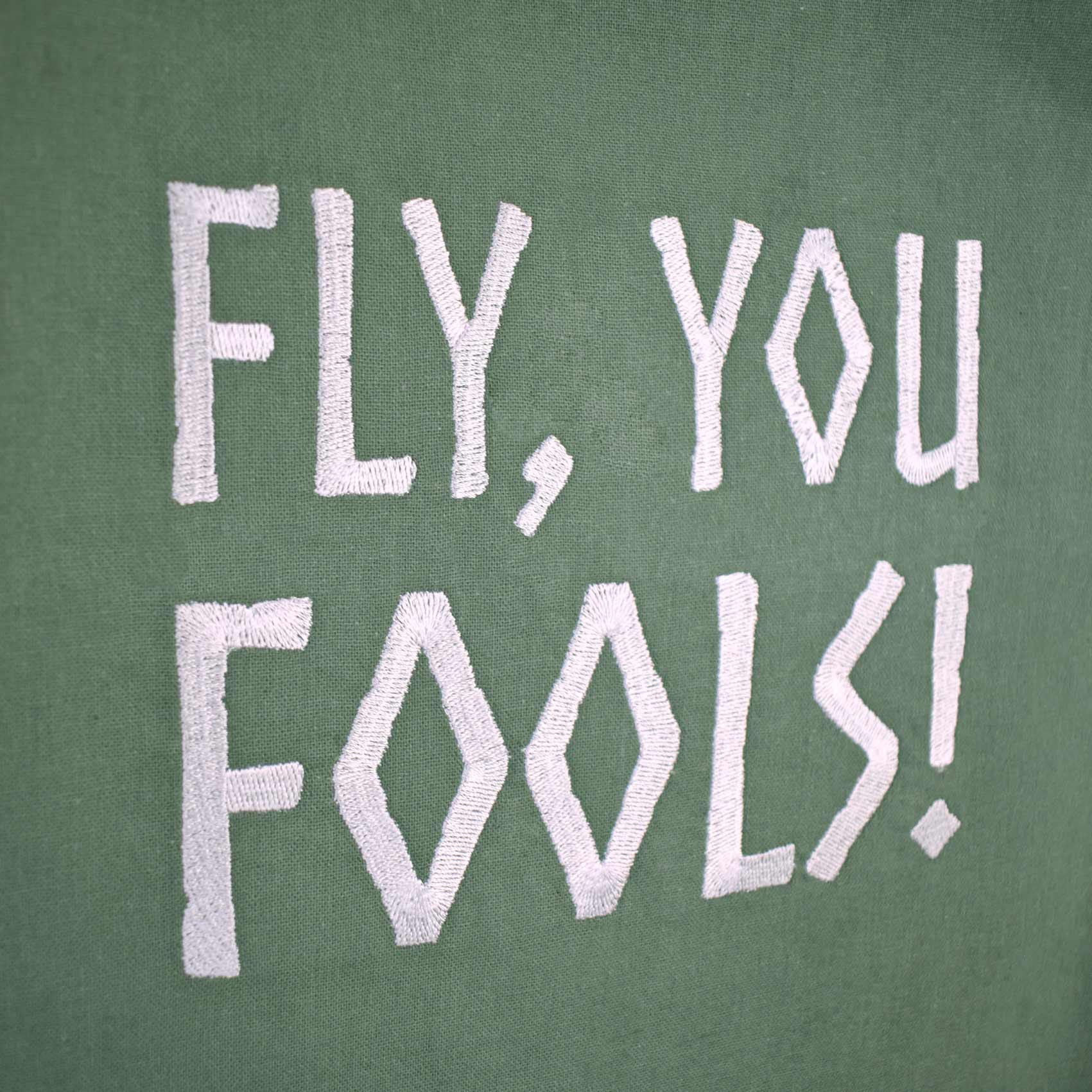 zeleni pamučni ceker s vezom natpisa "Fly, you fools!"