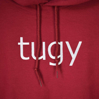 bordo hudica s vezom natpisa "tugy"