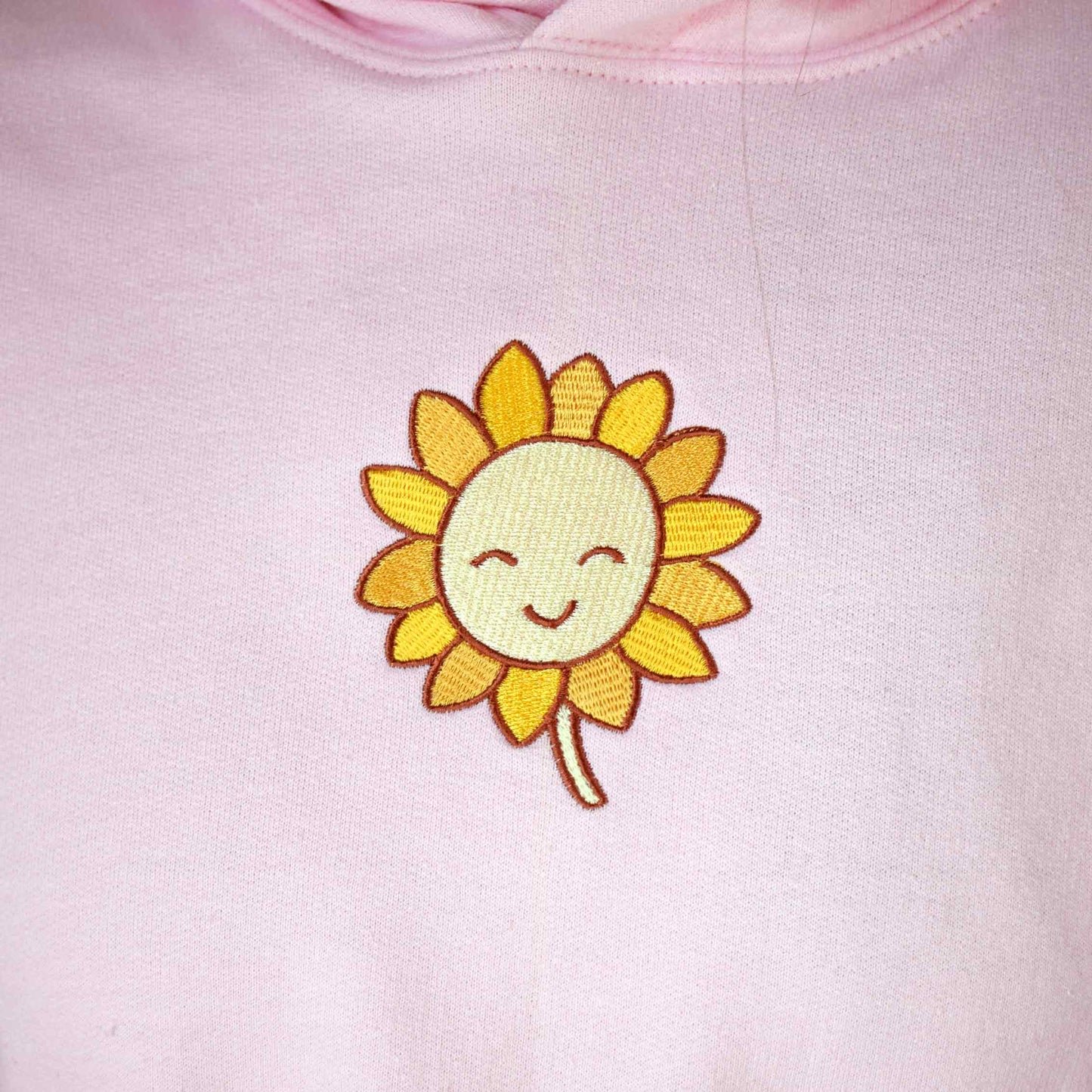 svijetlo roza hudica s vezom suncokreta