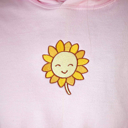 svijetlo roza hudica s vezom suncokreta