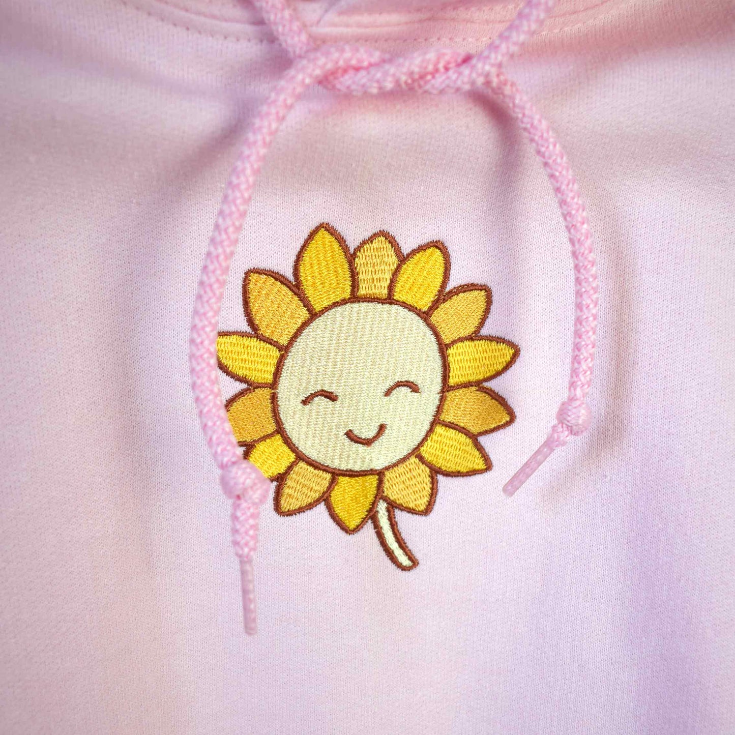 svijetlo roza hudica s vezom suncokreta